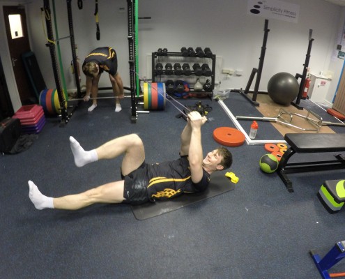 DCIM100GOPROGOPR0326. man performing resistance exercise